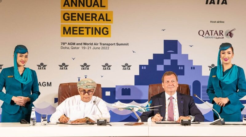 Oman Air CEO Eng Abdulaziz Al Raisi (seated, left) and oneworld CEO Rob Gurney (seated, right) sign the agreement for Oman Air to join oneworld in Doha at the IATA Annual General Meeting