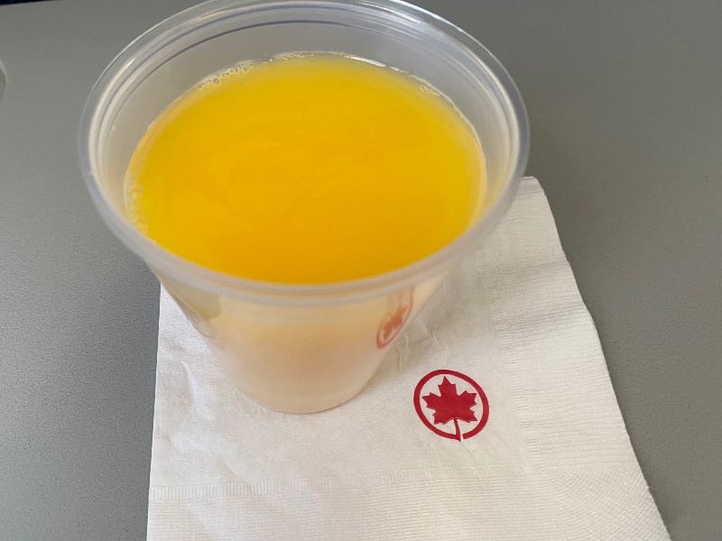 Complimentary orange juice in Air Canada Economy Class
