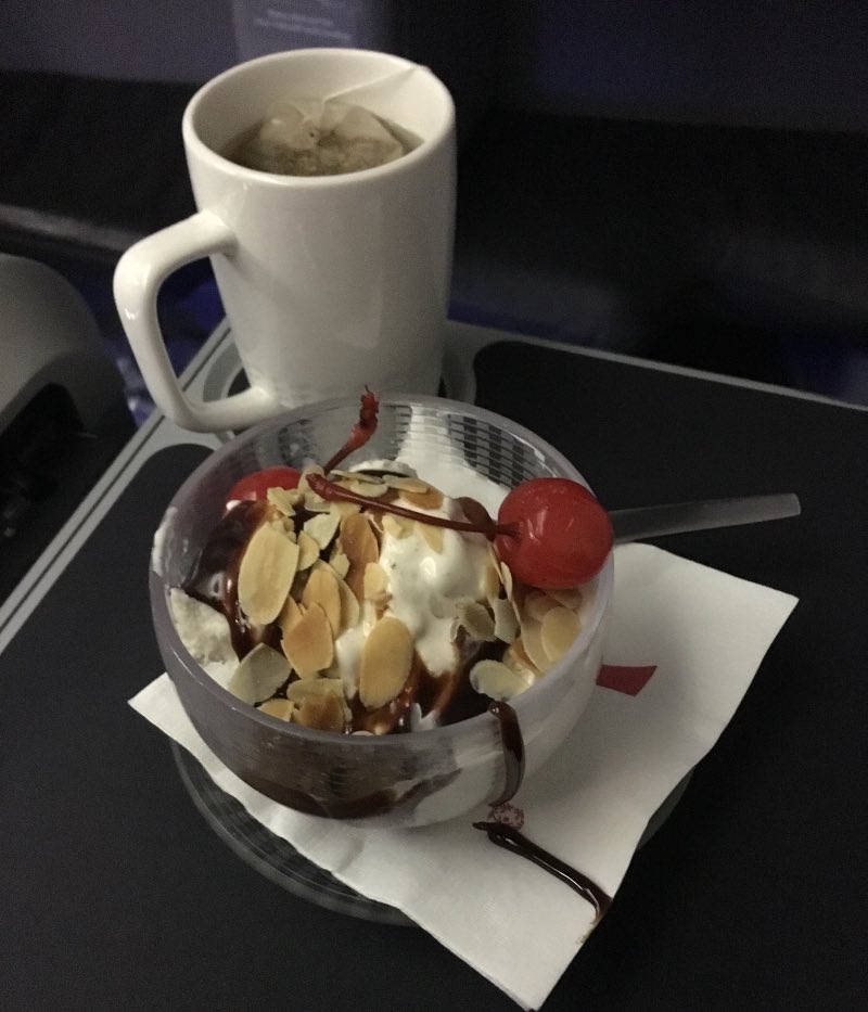 Ice cream sundae for dessert after the first meal service in United Business Class
